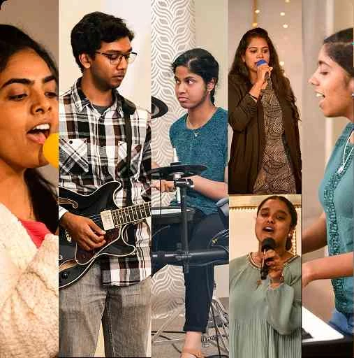 Members of the Creed Church worship team singing and playing guitar, drums and keyboard