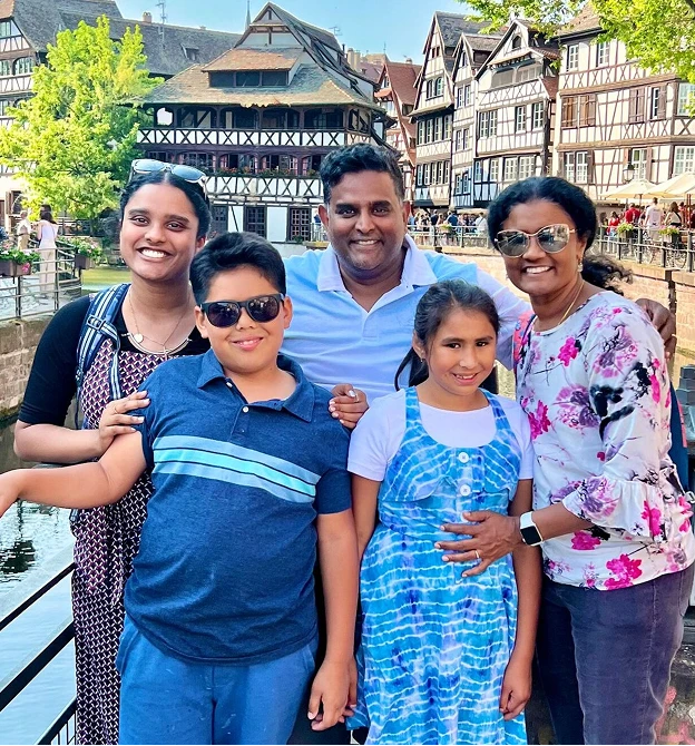 The lead pastor of Creed Church with his wife and three children